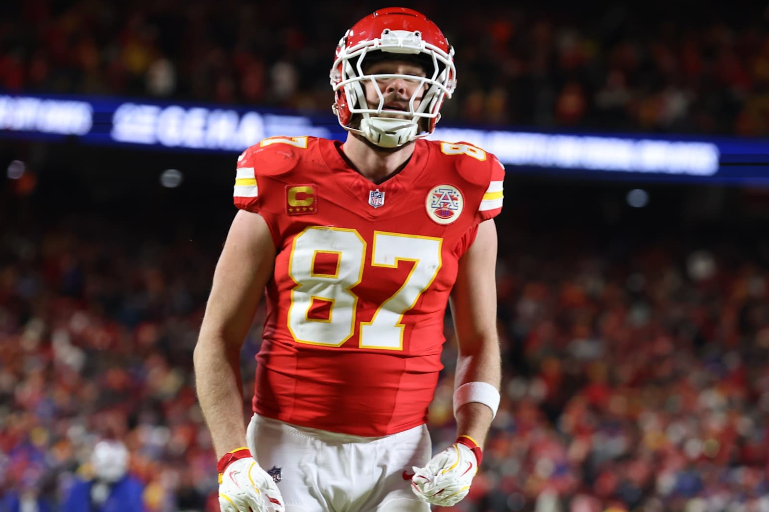 KANSAS CITY, MO - JANUARY 26: Kansas City Chiefs tight end Travis Kelce (87) celebrates after quarterback Patrick Mahomes (15) scored a touchdown in the second quarter of the AFC Championship game between the Buffalo Bills and Kansas City Chiefs on January 26, 2025 at GEHA Field at Arrowhead Stadium in Kansas City, MO. (Photo by Scott Winters/Icon Sportswire via Getty Images)