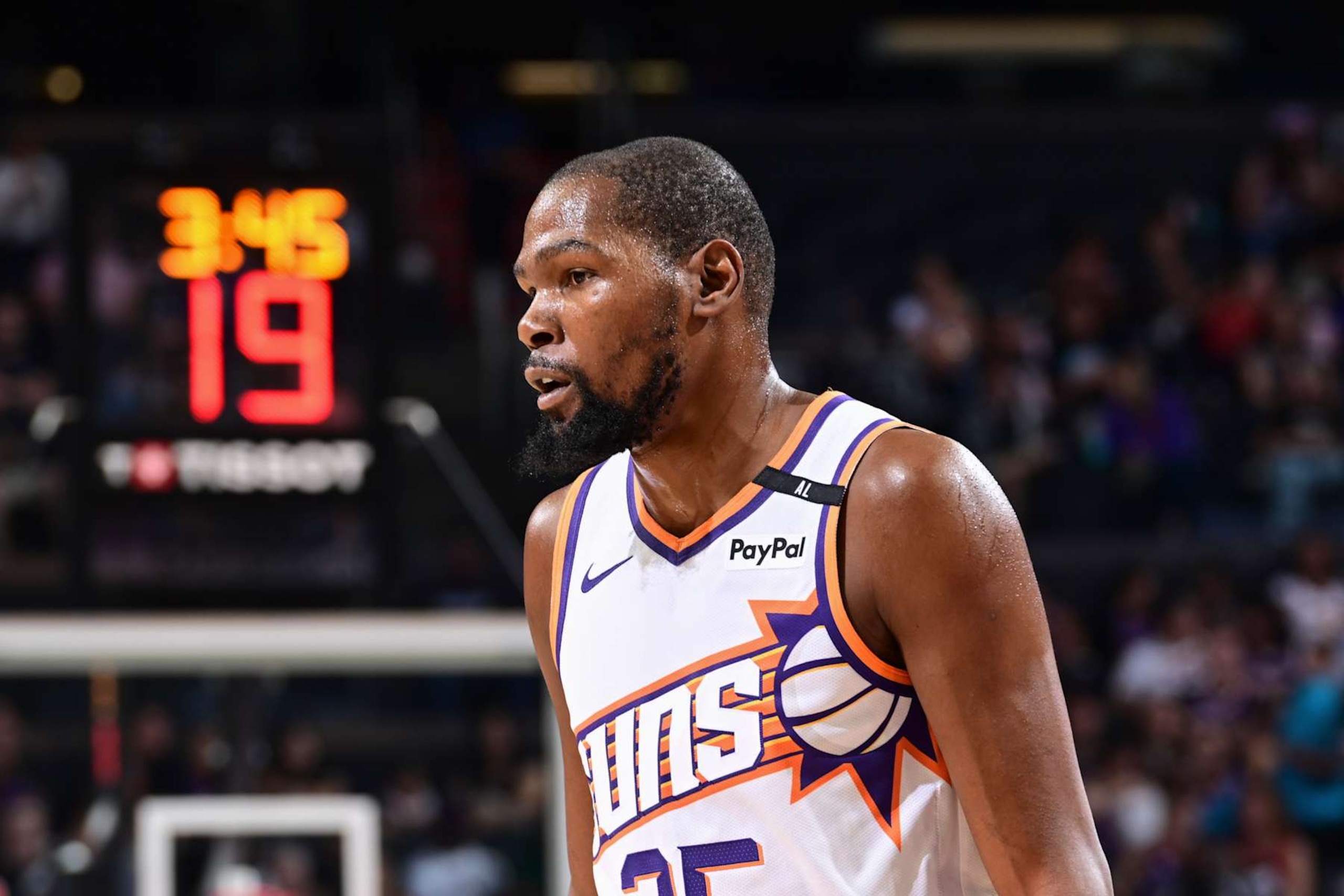 PHOENIX, AZ - OCTOBER 11: Kevin Durant #35 of the Phoenix Suns looks on during the game on October 11, 2024 at Footprint Center in Phoenix, Arizona. NOTE TO USER: User expressly acknowledges and agrees that, by downloading and or using this photograph, user is consenting to the terms and conditions of the Getty Images License Agreement. Mandatory Copyright Notice: Copyright 2024 NBAE (Photo by Kate Frese/NBAE via Getty Images)