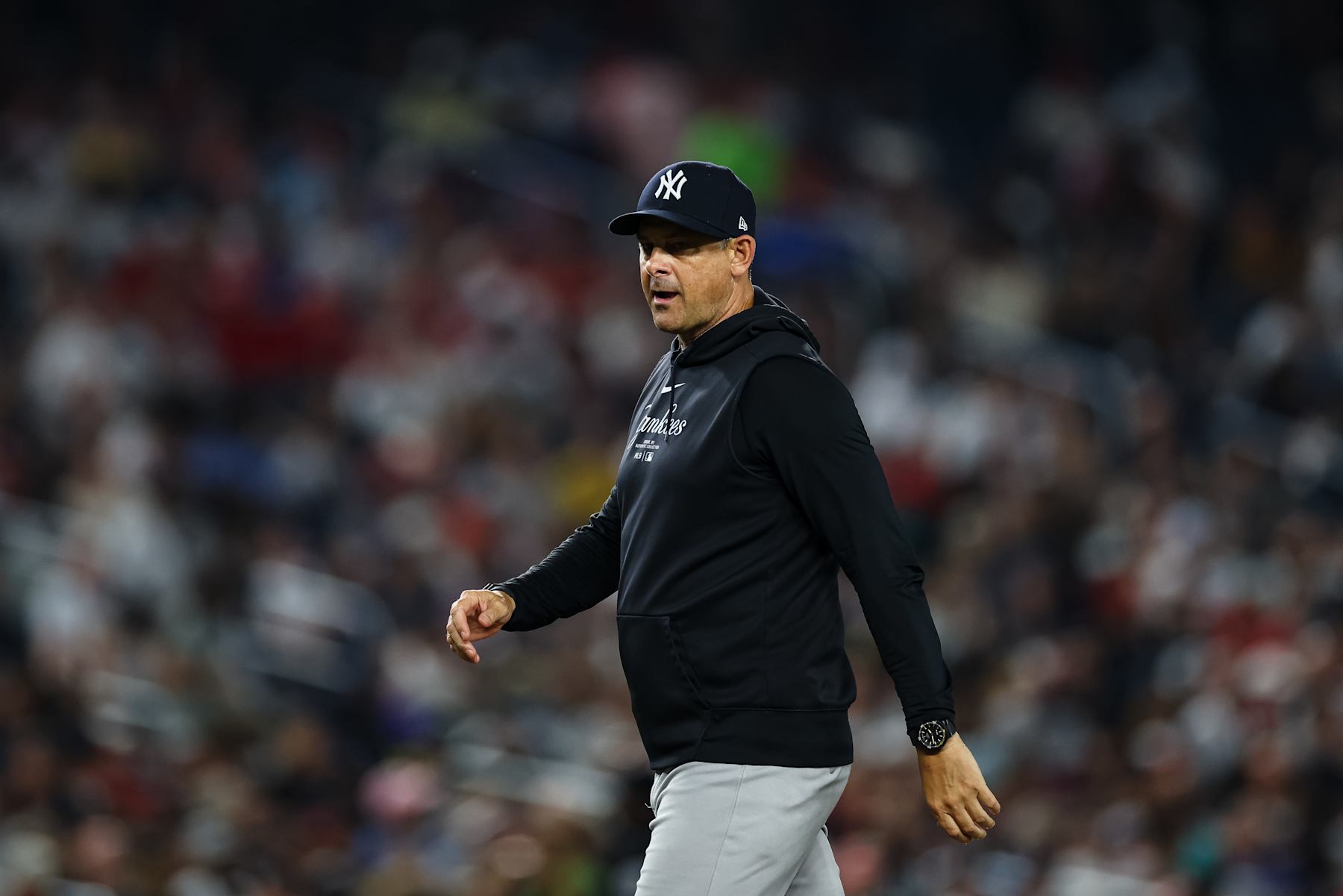 WASHINGTON, DC - AUGUST 26: Manager Aaron Boone #17 of the New York Yankees looks on during the sixth inning against the Washington Nationals at Nationals Park on August 26, 2024 in Washington, DC. (Photo by Scott Taetsch/Getty Images)