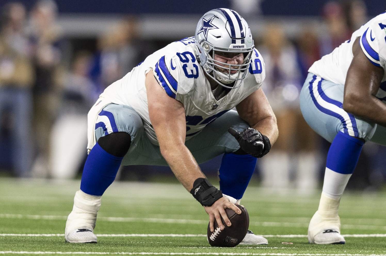 ARLINGTON, TEXAS - JANUARY 14: Tyler Biadasz #63 of the Dallas Cowboys lines up during an NFL wild-card playoff football game between the Dallas Cowboys and the Green Bay Packers at AT&T Stadium on January 14, 2024 in Arlington, Texas. (Photo by Michael Owens/Getty Images)