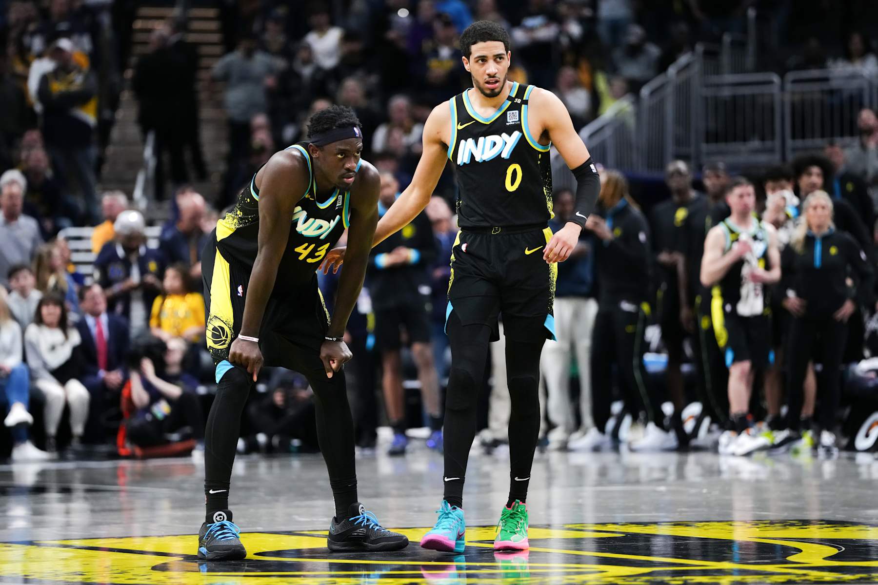 INDIANAPOLIS, INDIANA - APRIL 07: Pascal Siakam #43 and Tyrese Haliburton #0 of the Indiana Pacers meet in the fourth quarter against the Miami Heat at Gainbridge Fieldhouse on April 07, 2024 in Indianapolis, Indiana. NOTE TO USER: User expressly acknowledges and agrees that, by downloading and or using this photograph, User is consenting to the terms and conditions of the Getty Images License Agreement. (Photo by Dylan Buell/Getty Images)