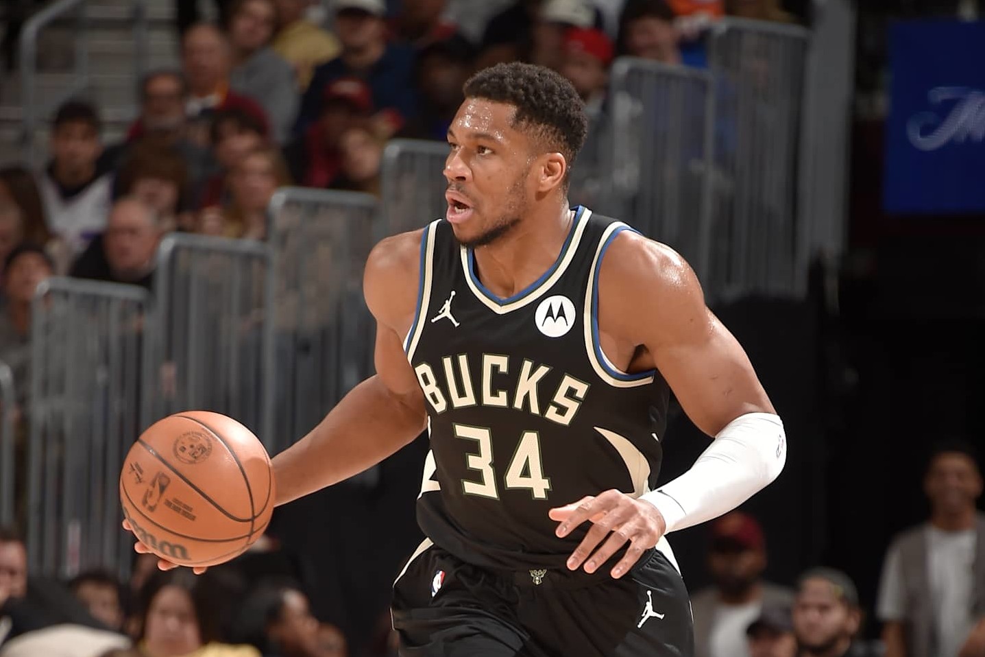 CLEVELAND, OH - DECEMBER 20:  Giannis Antetokounmpo #34 of the Milwaukee Bucks dribbles the ball during the game against the Cleveland Cavaliers during regular season game on December 20, 2024 at Rocket Mortgage FieldHouse in Cleveland, Ohio. NOTE TO USER: User expressly acknowledges and agrees that, by downloading and/or using this Photograph, user is consenting to the terms and conditions of the Getty Images License Agreement. Mandatory Copyright Notice: Copyright 2024 NBAE (Photo by David Liam Kyle/NBAE via Getty Images)