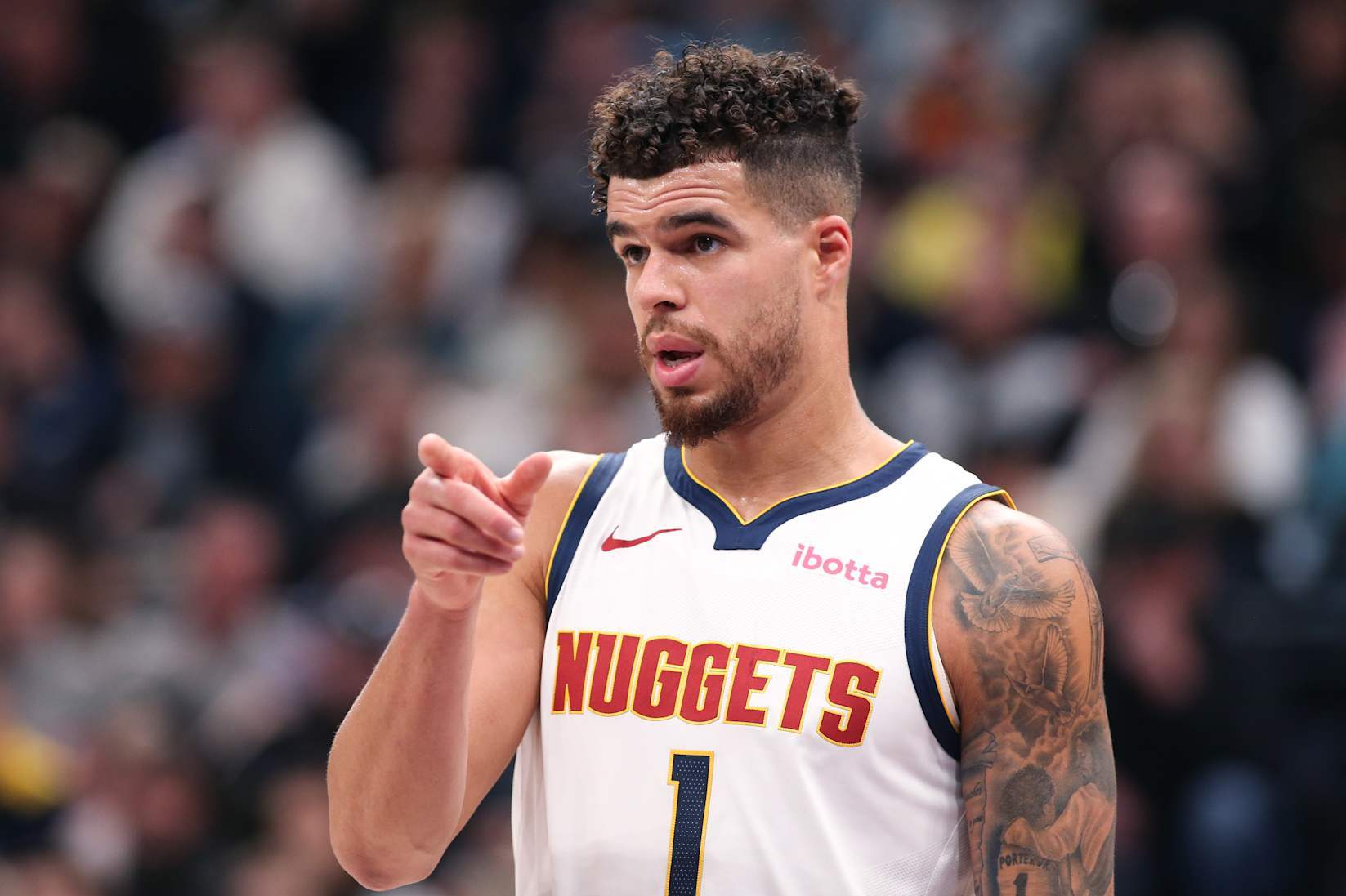 SALT LAKE CITY , UT - NOVEMBER 27:  Michael Porter Jr., #1 of the Denver Nuggets gestures to a teammate during the second half of their game against the Utah Jazz at the Delta Center on November 27, 2024 in Salt Lake City, Utah.  NOTE TO USER: User expressly acknowledges and agrees that, by downloading and or using this photograph, User is consenting to the terms and conditions of the Getty Images License Agreement. (Photo by Chris Gardner/Getty Images)