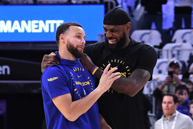 SAN FRANCISCO, CA - DECEMBER 25: LeBron James #23 of the Los Angeles Lakers and Stephen Curry #30 of the Golden State Warriors talk before the game on December 25, 2024 at Chase Center in San Francisco, California. NOTE TO USER: User expressly acknowledges and agrees that, by downloading and or using this photograph, user is consenting to the terms and conditions of Getty Images License Agreement. Mandatory Copyright Notice: Copyright 2024 NBAE (Photo by Noah Graham/NBAE via Getty Images)