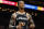 ATLANTA, GA - DECEMBER 28: John Collins #20 of the Atlanta Hawks reacts during the second half against the Brooklyn Nets at State Farm Arena on December 28, 2022 in Atlanta, Georgia. NOTE TO USER: User expressly acknowledges and agrees that, by downloading and or using this photograph, User is consenting to the terms and conditions of the Getty Images License Agreement. (Photo by Todd Kirkland/Getty Images)