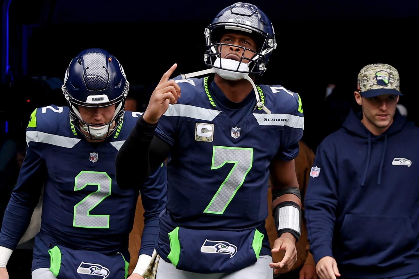 SEATTLE, WASHINGTON - NOVEMBER 12: Geno Smith #7 of the Seattle Seahawks runs onto the filed prior to a game against the Washington Commanders at Lumen Field on November 12, 2023 in Seattle, Washington. (Photo by Steph Chambers/Getty Images) SEATTLE, WASHINGTON - NOVEMBER 12: Geno Smith #7 of the Seattle Seahawks runs onto the filed prior to a game against the Washington Commanders at Lumen Field on November 12, 2023 in Seattle, Washington. (Photo by Steph Chambers/Getty Images)