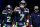 SEATTLE, WASHINGTON - NOVEMBER 12: Geno Smith #7 of the Seattle Seahawks runs onto the filed prior to a game against the Washington Commanders at Lumen Field on November 12, 2023 in Seattle, Washington. (Photo by Steph Chambers/Getty Images)