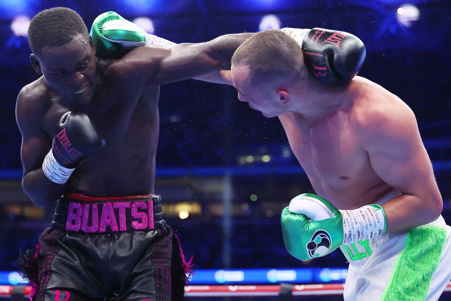 LONDON, ENGLAND - SEPTEMBER 21: Joshua Buatsi and Willy Hutchinson exchange punches during the WBO Interim World Light Heavyweight Title fight between Joshua Buatsi and Willy Hutchinson, on the Riyadh Season - Wembley Edition card at Wembley Stadium on September 21, 2024 in London, England. (Photo by Richard Pelham/Getty Images)
