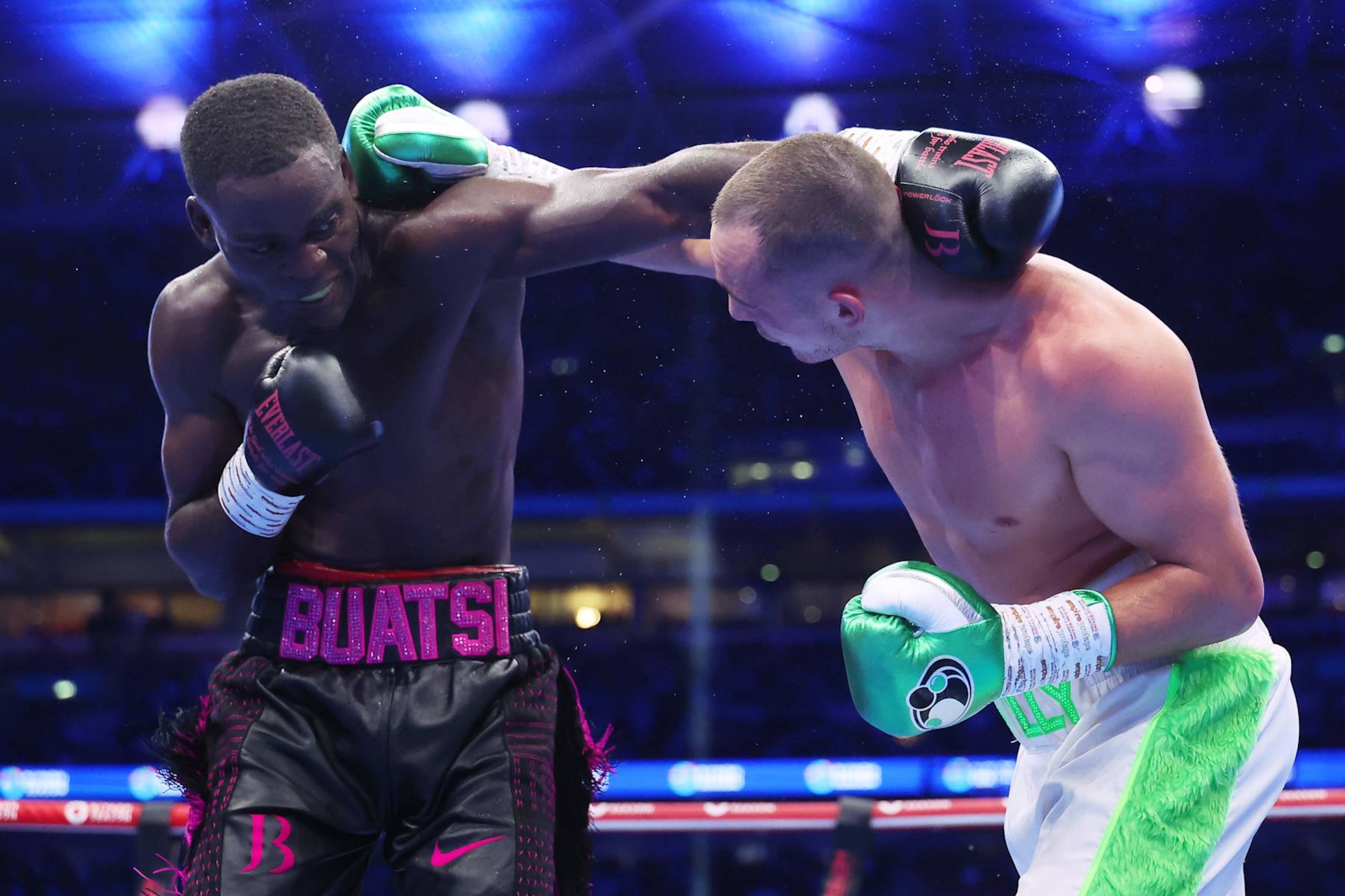 LONDON, ENGLAND - SEPTEMBER 21: Joshua Buatsi and Willy Hutchinson exchange punches during the WBO Interim World Light Heavyweight Title fight between Joshua Buatsi and Willy Hutchinson, on the Riyadh Season  - Wembley Edition card at Wembley Stadium on September 21, 2024 in London, England. (Photo by Richard Pelham/Getty Images)