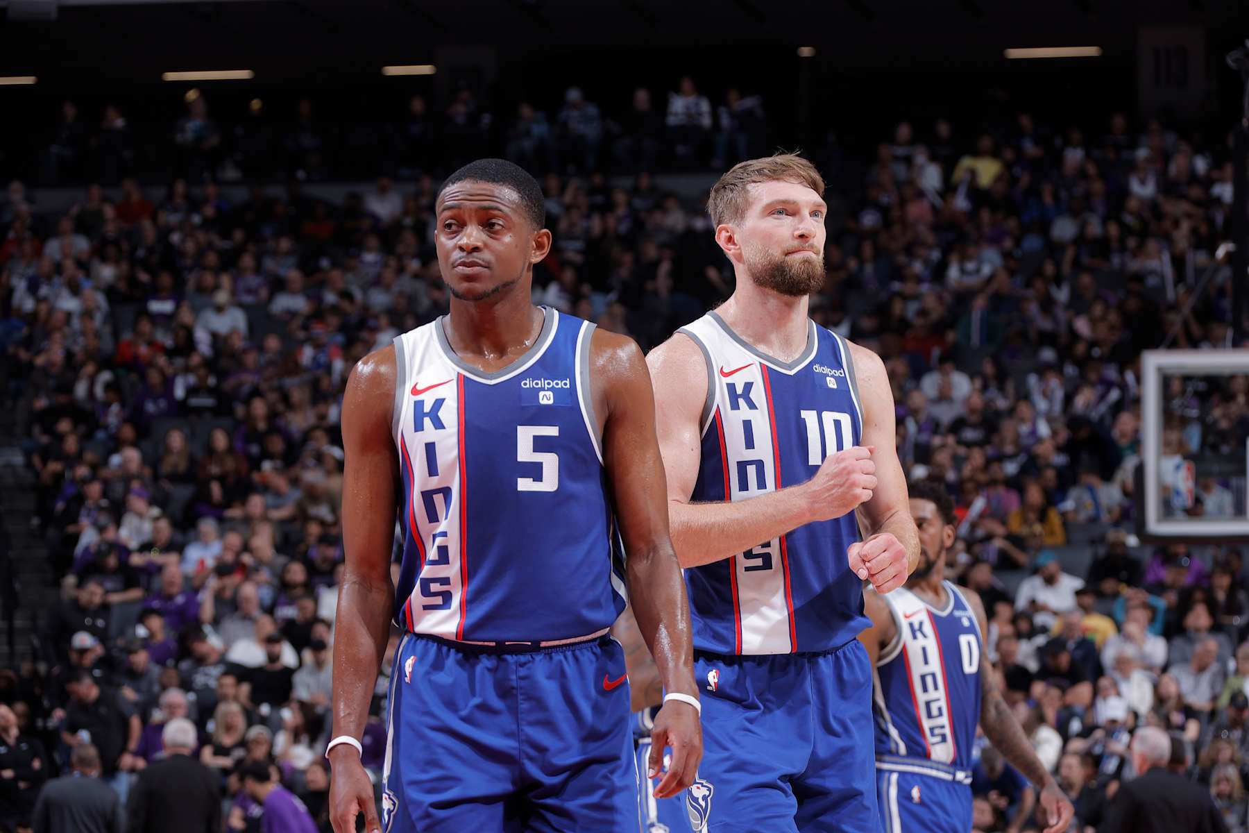 SACRAMENTO, CA - MARCH 18: De'Aaron Fox #5 and Domantas Sabonis #10 of the Sacramento Kings look on during the game against the Memphis Grizzlies on March 18, 2024 at Golden 1 Center in Sacramento, California. NOTE TO USER: User expressly acknowledges and agrees that, by downloading and or using this photograph, User is consenting to the terms and conditions of the Getty Images Agreement. Mandatory Copyright Notice: Copyright 2024 NBAE (Photo by Rocky Widner/NBAE via Getty Images)