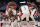 WASHINGTON, DC - OCTOBER 25: Rui Hachimura #8, Will Barton #5 and Monte Morris #22 give Bradley Beal #3 of the Washington Wizards a hand after he is fouled by the Detroit Pistons during the second half at Capital One Arena on October 25, 2022 in Washington, DC. NOTE TO USER: User expressly acknowledges and agrees that, by downloading and or using this photograph, User is consenting to the terms and conditions of the Getty Images License Agreement. (Photo by Jess Rapfogel/Getty Images)