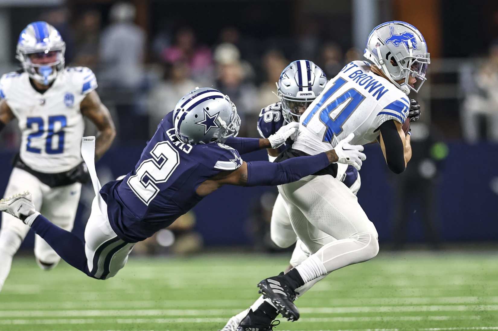 Lions’ Amon-Ra St. Brown, Cowboys’ Jourdan Lewis Exchange Barbs amid Apparent Beef