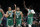 Boston - May 3: The Celtics Derrick White, Al Horford, Grant Williams, Jayson Tatum and Robert Williams head for the bench as Milwaukee calls a timeout late in the fourth quarter and the reserves would come onto the floor to finish off the blowout Boston victory. The Bucks Pat Connaughton is in the background at far right. The Boston Celtics host the Milwaukee Bucks in Game 2 of the Eastern Conference semi-finals between the Celtics and Bucks on May 3, 2022 at TD Garden in Boston. (Photo by Jim Davis/The Boston Globe via Getty Images)