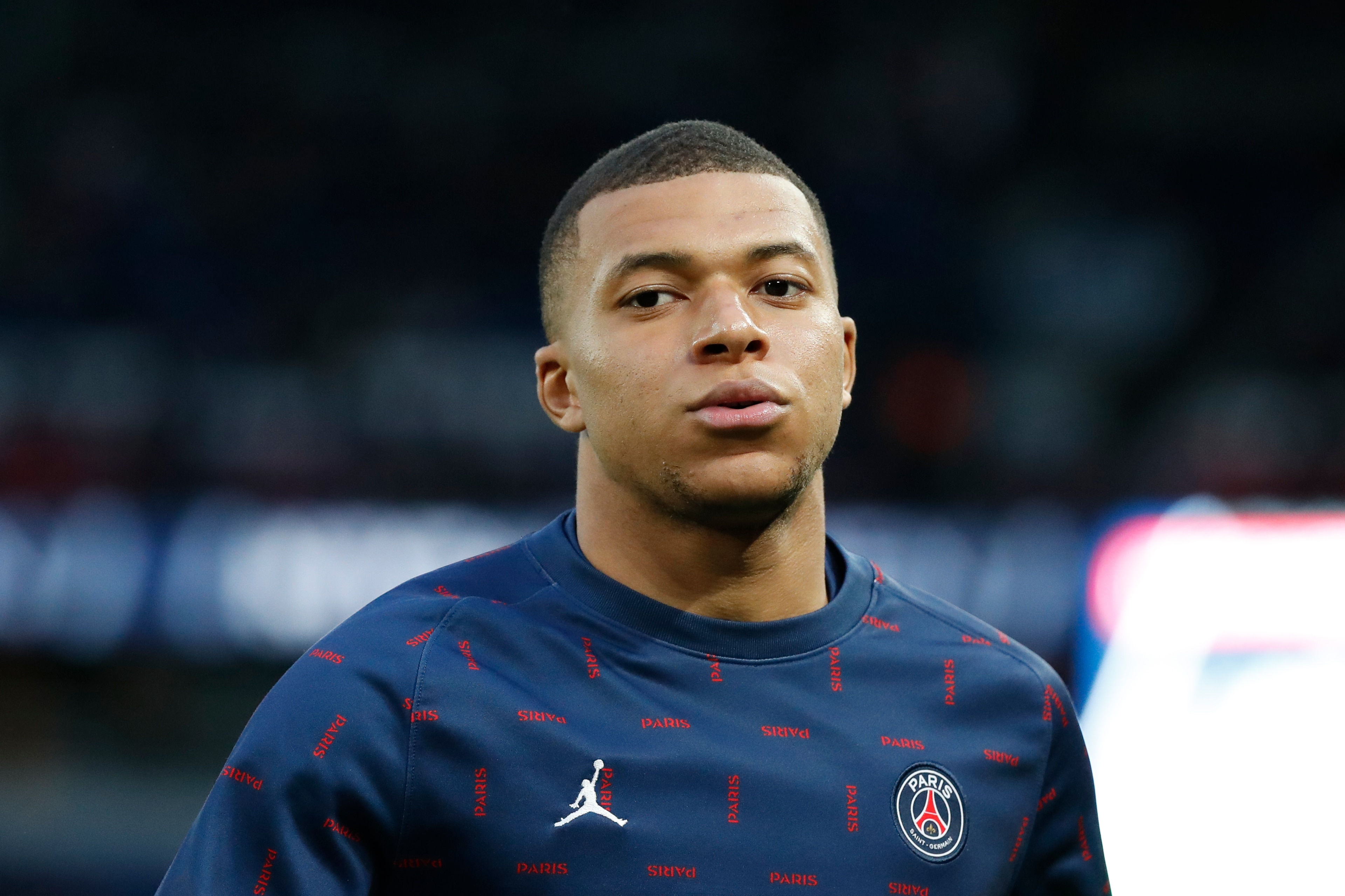 PARIS, FRANCE - APRIL 23: Kylian Mbappe #7 of Paris Saint-Germain warms up before the Ligue 1 Uber Eats match between Paris Saint Germain and RC Lens at Parc des Princes on April 23, 2022 in Paris, France. (Photo by Catherine Steenkeste/Getty Images)