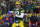 GREEN BAY, WISCONSIN - JANUARY 02: Aaron Rodgers #12 of the Green Bay Packers drops back to pass during a game against the Minnesota Vikings at Lambeau Field on January 02, 2022 in Green Bay, Wisconsin.  The Packers defeated the Vikings 37-10. (Photo by Stacy Revere/Getty Images)