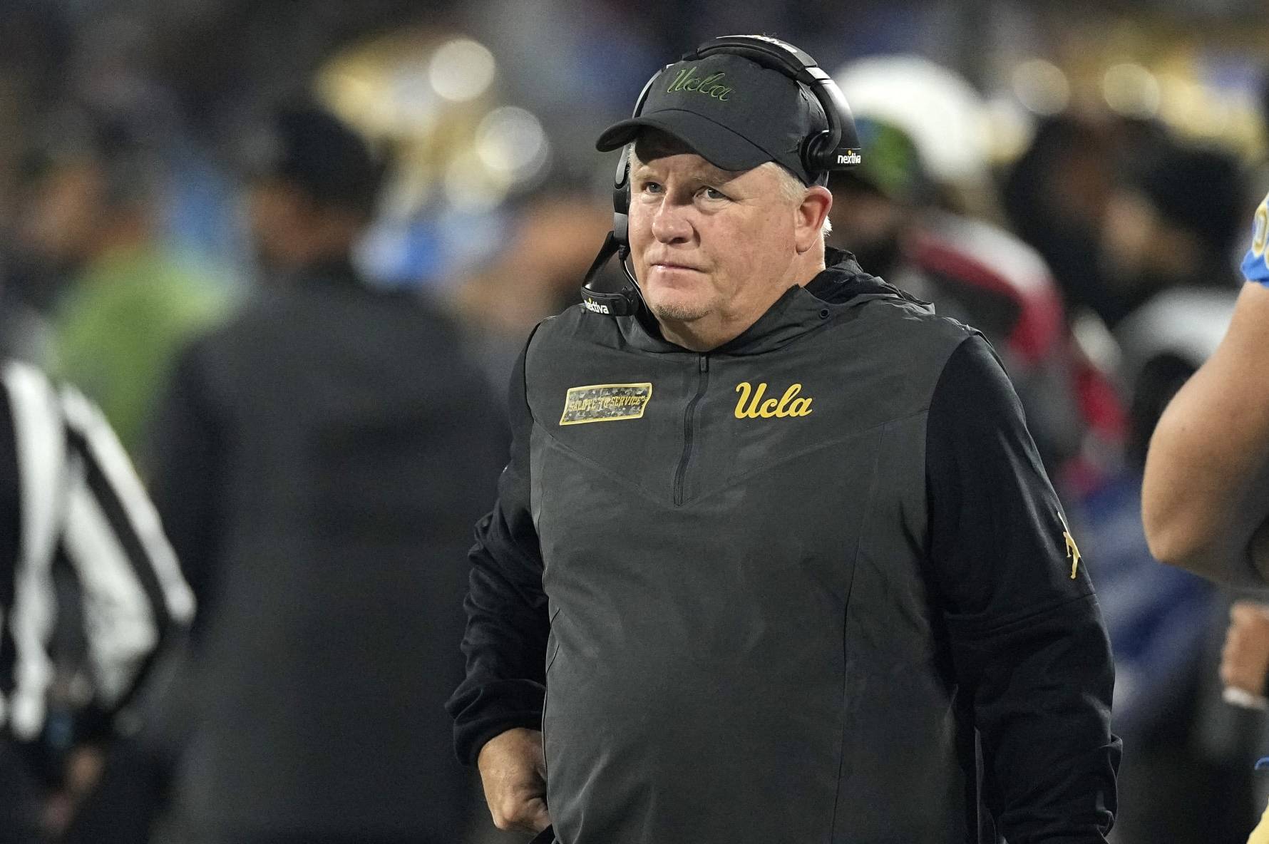 UCLA head coach Chip Kelly stands on the sideline during the first half of an NCAA college football game against Arizona Saturday, Nov. 12, 2022, in Pasadena, Calif. (AP Photo/Mark J. Terrill)