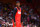 MIAMI, FLORIDA - OCTOBER 09: Jimmy Butler #22 of the Miami Heat reacts during the during the Miami Heat Red, White & Pink Game at Kaseya Center on October 09, 2023 in Miami, Florida. Proceeds from the game benefit cancer care and research at the Miami Cancer Institute at Baptist Health South Florida. NOTE TO USER: User expressly acknowledges and agrees that, by downloading and or using this photograph, User is consenting to the terms and conditions of the Getty Images License Agreement. (Photo by Megan Briggs/Getty Images)