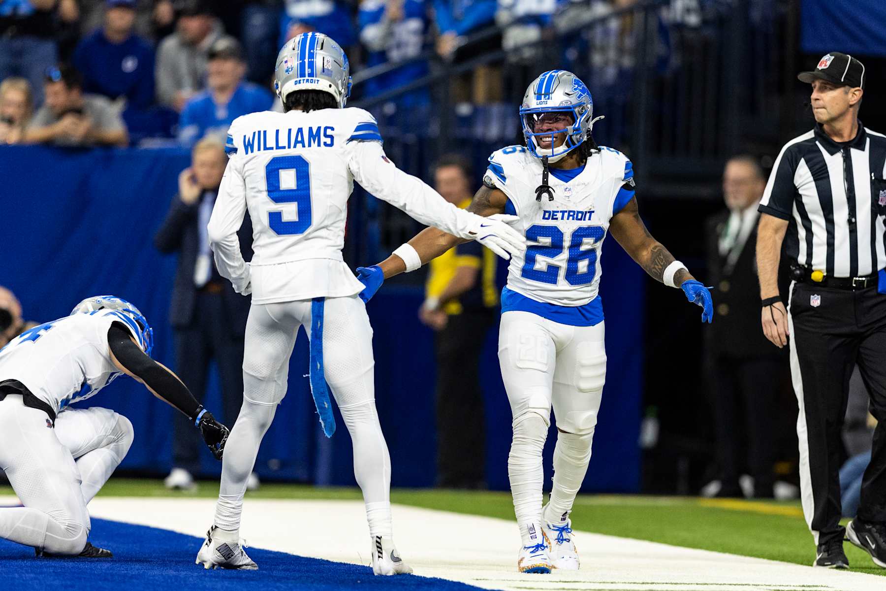 INDIANAPOLIS, INDIANA - NOVEMBER 24: Jahmyr Gibbs #26 of the Detroit Lions celebrates with Jameson Williams #9 after scoring a touchdown in the second quarter of the game against the Indianapolis Colts at Lucas Oil Stadium on November 24, 2024 in Indianapolis, Indiana. The Lions beat the Colts 24-6. (Photo by Lauren Leigh Bacho/Getty Images)