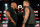 ARLINGTON, TEXAS - MAY 16: (L-R) Mike Tyson, Nakisa Bidarian and Jake Paul pose onstage during the Jake Paul vs. Mike Tyson Boxing match Arlington press conference at Texas Live! on May 16, 2024 in Arlington, Texas. (Photo by Cooper Neill/Getty Images for Netflix)