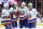 RALEIGH, NORTH CAROLINA - APRIL 30: Mike Reilly #2 of the New York Islanders celebrates with teammates Bo Horvat #14, Brock Nelson #29 and Mathew Barzal #13 after scoring a power play goal against the Carolina Hurricanes during the first period in Game Five of the First Round of the 2024 Stanley Cup Playoffs at PNC Arena on April 30, 2024 in Raleigh, North Carolina. (Photo by Grant Halverson/Getty Images)