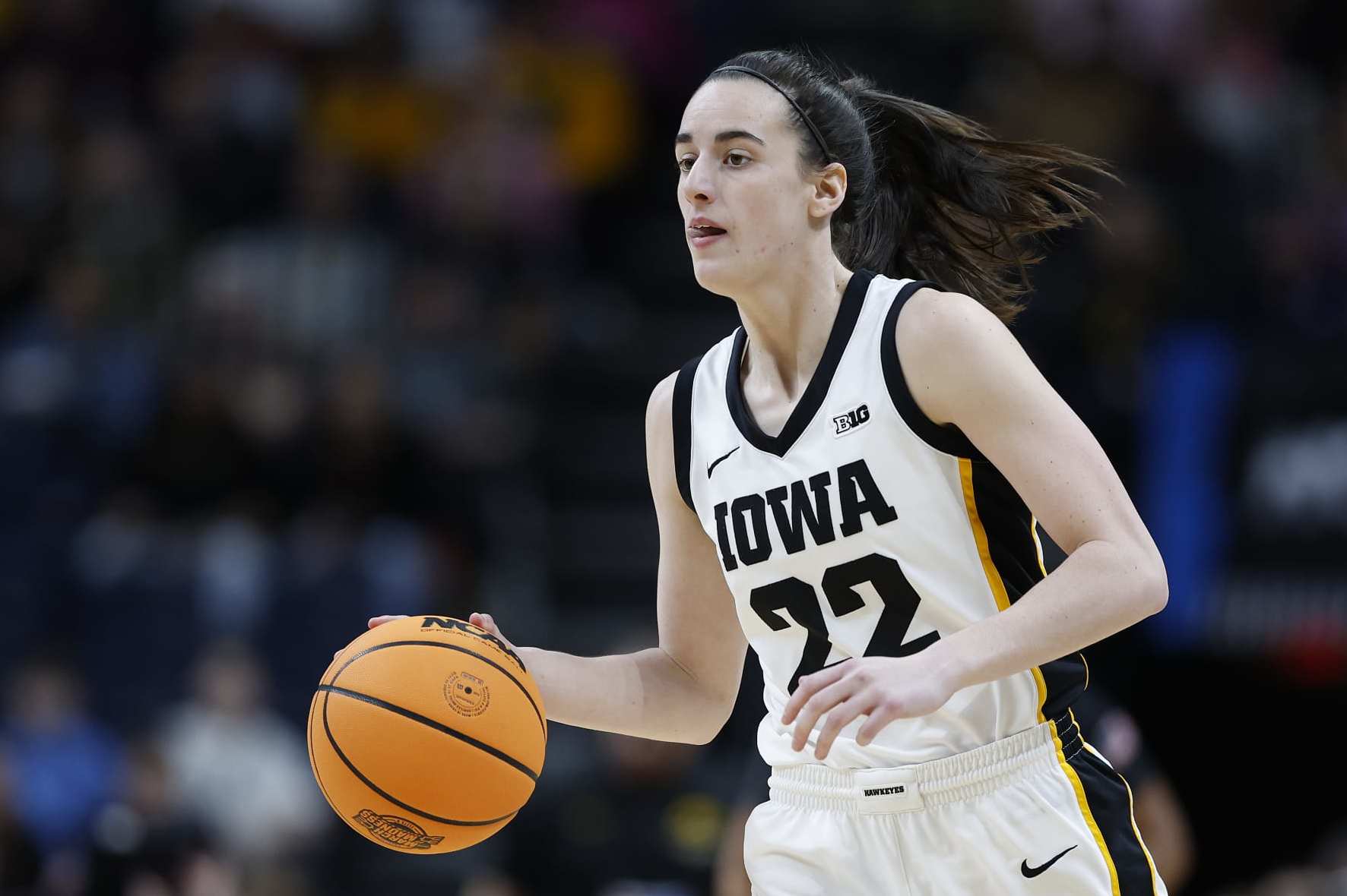 ALBANY, NEW YORK - APRIL 01: Caitlin Clark #22 of the Iowa Hawkeyes dribbles during the first half against the LSU Tigers in the Elite 8 round of the NCAA Women's Basketball Tournament at MVP Arena on April 01, 2024 in Albany, New York. (Photo by Sarah Stier/Getty Images)
