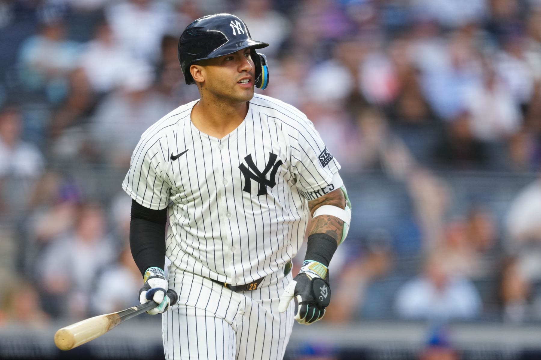 NEW YORK, NY - JULY 23:   Gleyber Torres #25 of the New York Yankees hits a solo home run in the second inning during the game between the New York Mets and the New York Yankees at Yankee Stadium on Tuesday, July 23, 2024 in New York, New York. (Photo by Mary DeCicco/MLB Photos via Getty Images)