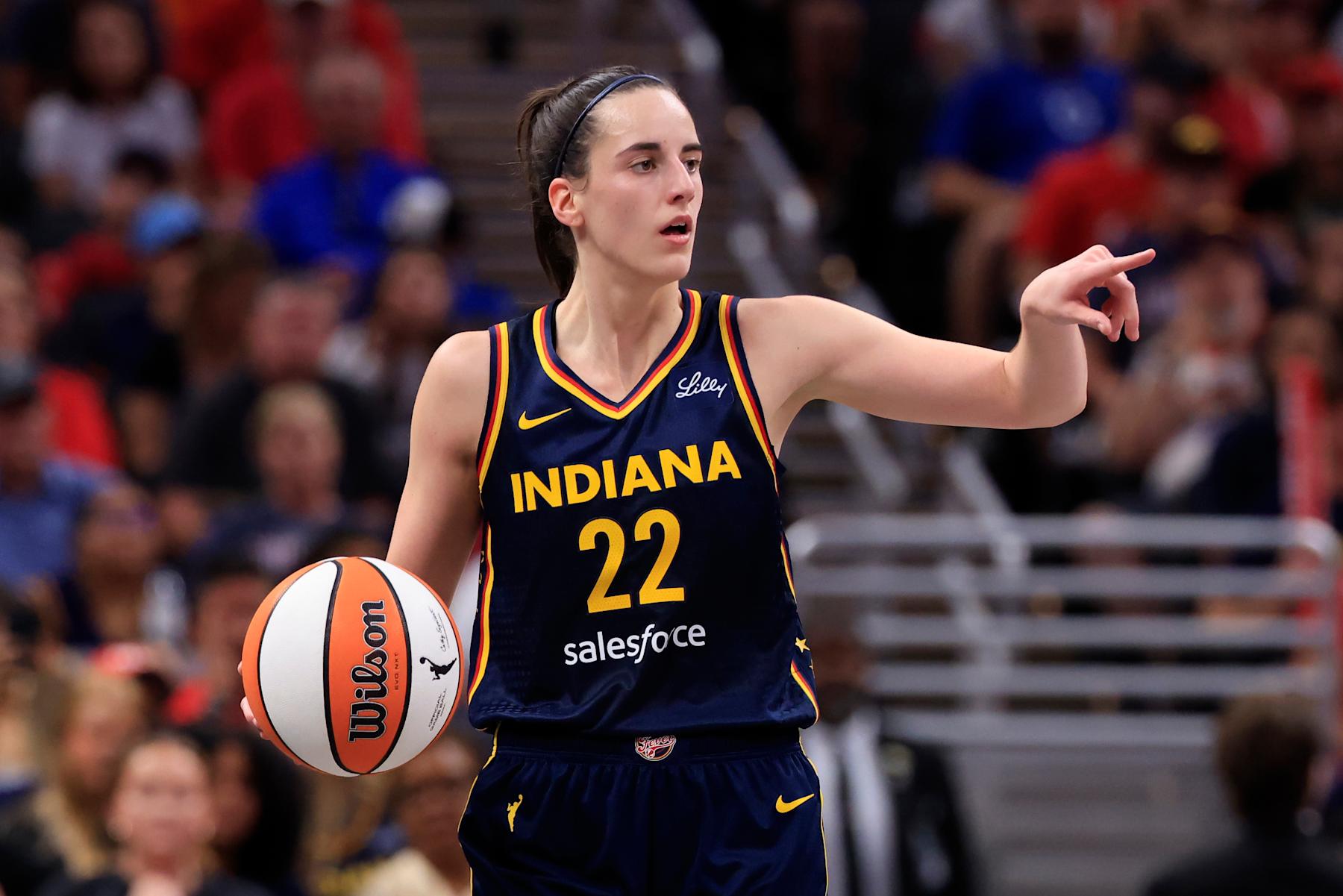 INDIANAPOLIS, INDIANA - SEPTEMBER 15: Caitlin Clark #22 of the Indiana Fever brings the ball up the court against the Dallas Wings at Gainbridge Fieldhouse on September 15, 2024 in Indianapolis, Indiana. NOTE TO USER: User expressly acknowledges and agrees that, by downloading and or using this photograph, User is consenting to the terms and conditions of the Getty Images License Agreement. (Photo by Justin Casterline/Getty Images)