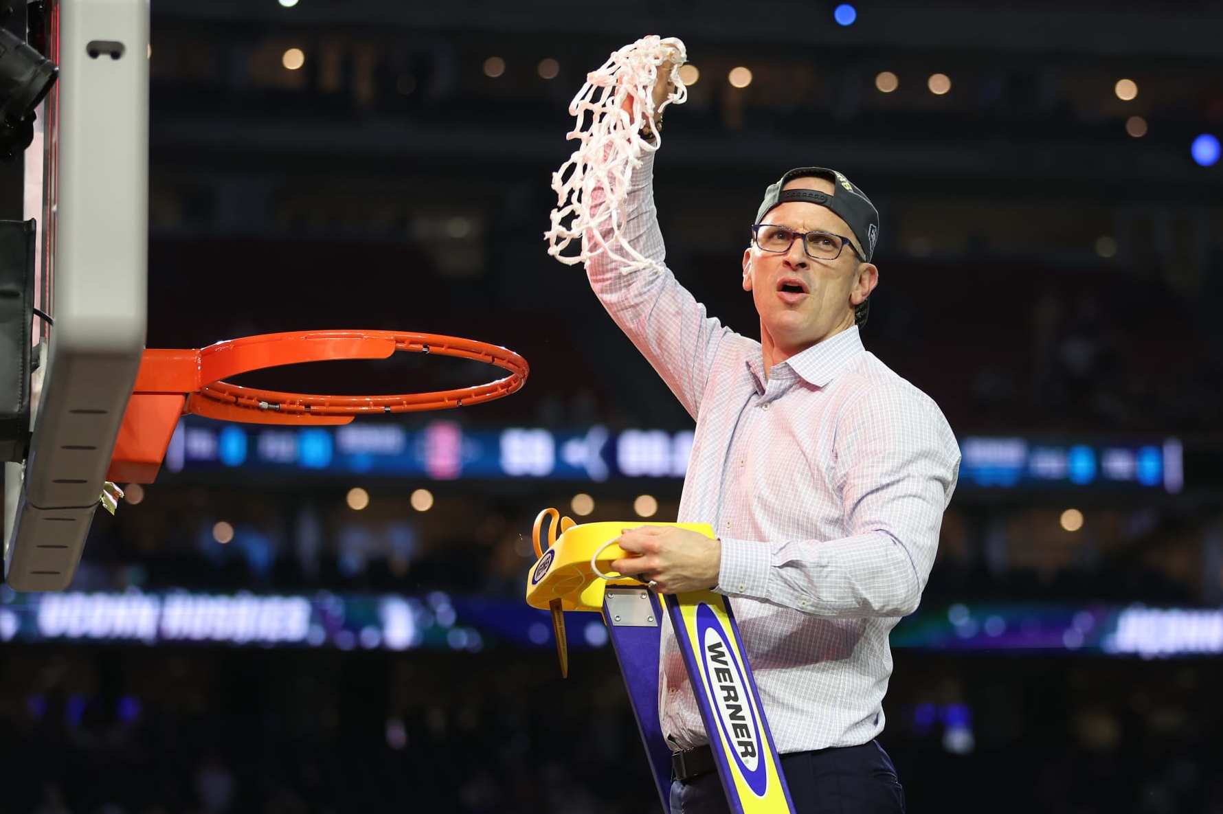 HOUSTON, TEXAS - APRIL 03: Head coach Dan Hurley of the Connecticut Huskies reacts as he cuts down the net after defeating the San Diego State Aztecs 76-59 during the NCAA Men's Basketball Tournament National Championship game at NRG Stadium on April 03, 2023 in Houston, Texas. (Photo by Gregory Shamus/Getty Images)