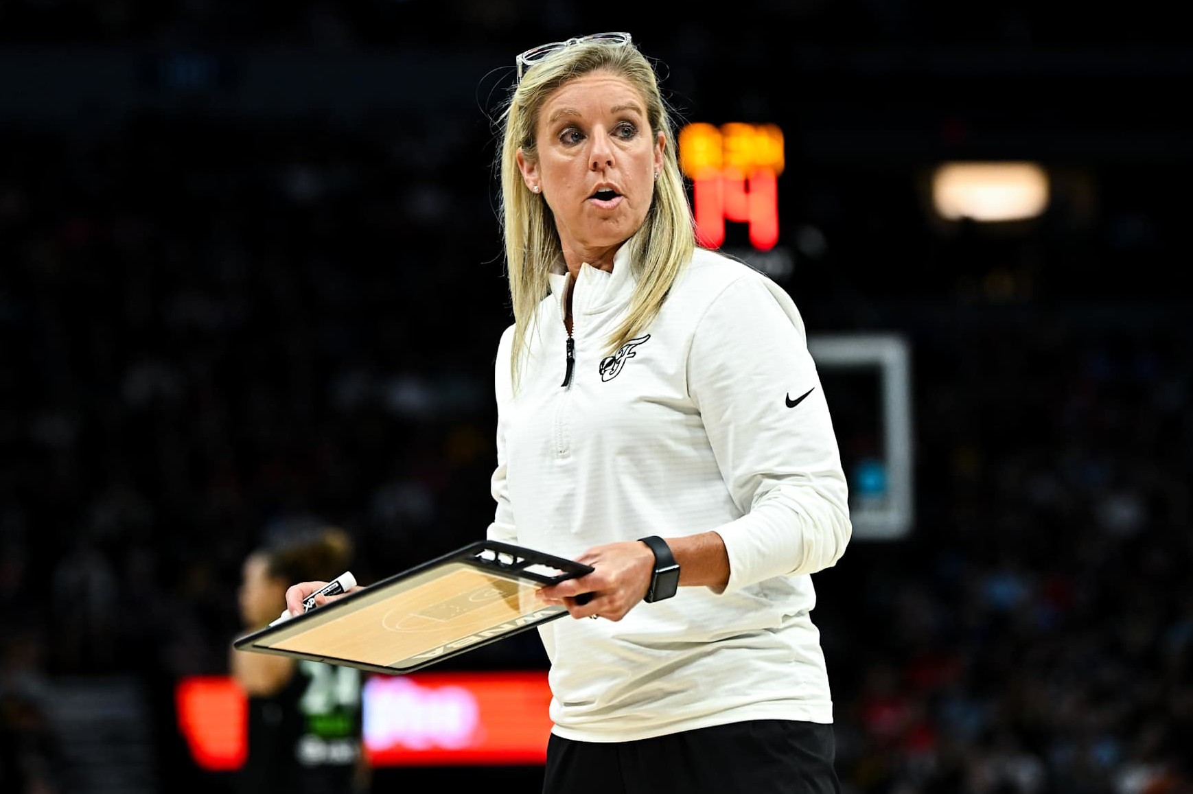 MINNEAPOLIS, MINNESOTA - AUGUST 24: Christie Sides head coach of the Indiana Fever directs her team in the second quarter of the game against the Minnesota Lynx at Target Center on August 24, 2024 in Minneapolis, Minnesota. NOTE TO USER: User expressly acknowledges and agrees that, by downloading and or using this photograph, User is consenting to the terms and conditions of the Getty Images License Agreement. (Photo by Stephen Maturen/Getty Images)