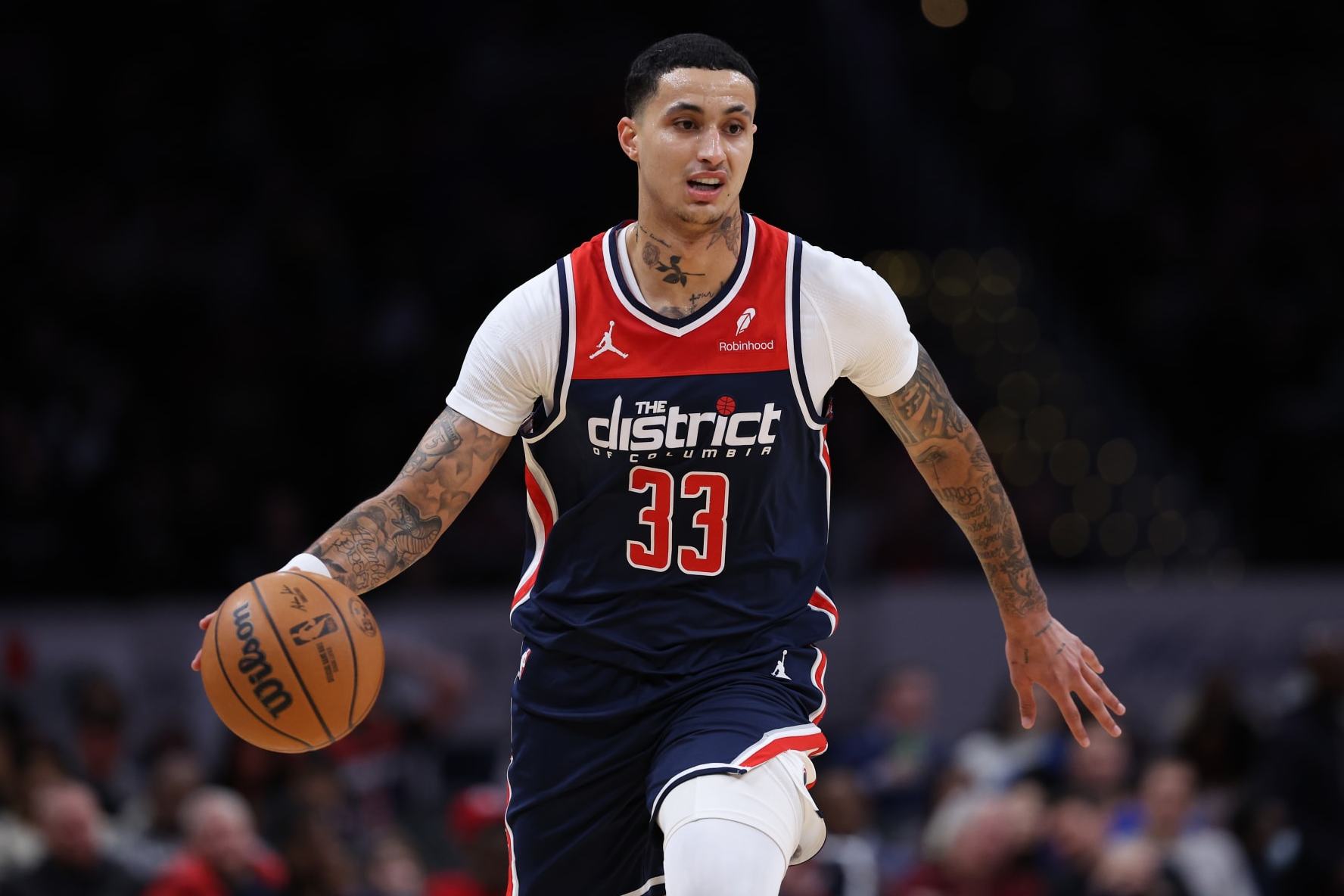 WASHINGTON, DC - JANUARY 15: Kyle Kuzma #33 of the Washington Wizards dribbles the ball up court against the Detroit Pistons at Capital One Arena on January 15, 2024 in Washington, DC. NOTE TO USER: User expressly acknowledges and agrees that, by downloading and or using this photograph, User is consenting to the terms and conditions of the Getty Images License Agreement  (Photo by Patrick Smith/Getty Images)