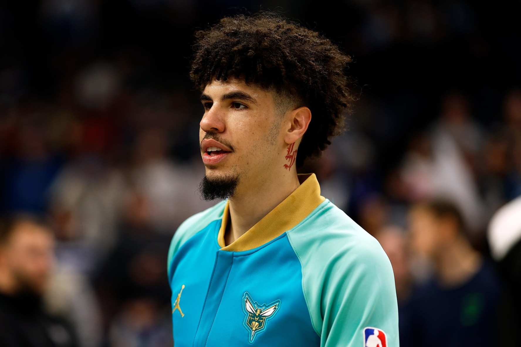 MINNEAPOLIS, MINNESOTA - JANUARY 22: LaMelo Ball #1 of the Charlotte Hornets looks on prior to the start of the game against the Minnesota Timberwolves at Target Center on January 22, 2024 in Minneapolis, Minnesota. The Hornets defeated the Timberwolves 128-125. NOTE TO USER: User expressly acknowledges and agrees that, by downloading and or using this photograph, User is consenting to the terms and conditions of the Getty Images License Agreement. (Photo by David Berding/Getty Images)