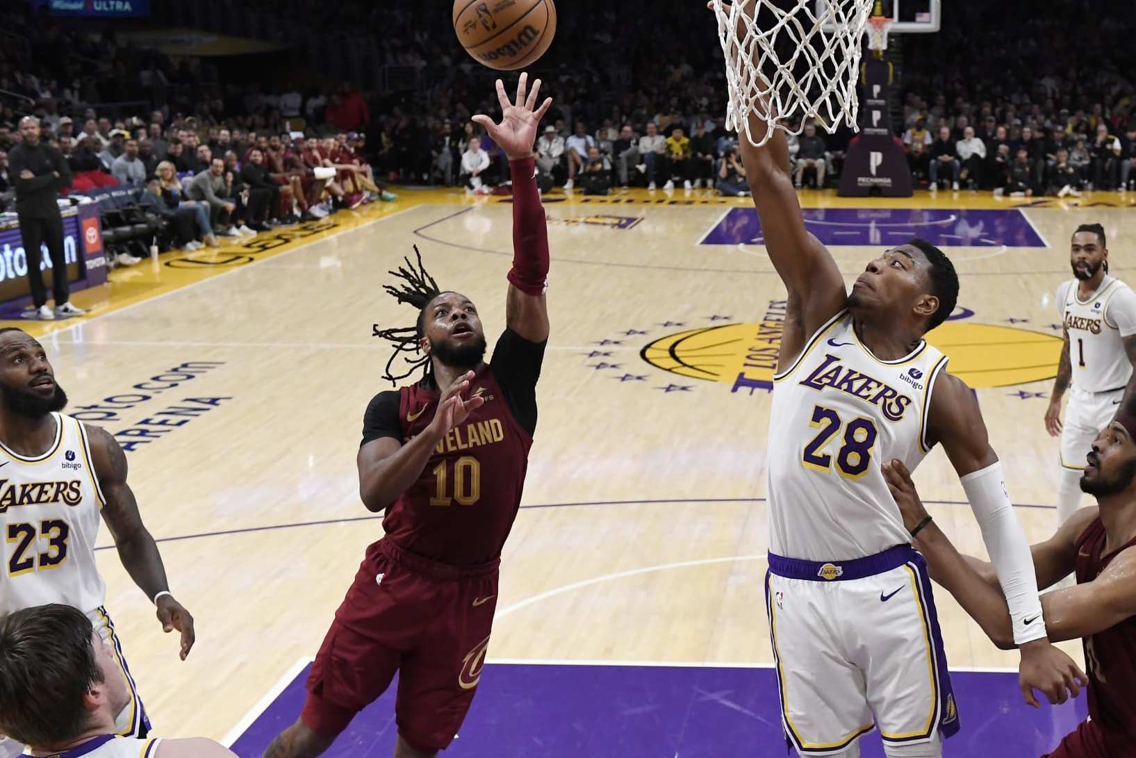 LOS ANGELES, CALIFORNIA - APRIL 6: Darius Garland #10 of the Cleveland Cavaliers scores on floater against Rui Hachimura #28 of the Los Angeles Lakers during the second half at Crypto.com Arena on April 6, 2024 in Los Angeles, California. NOTE TO USER: User expressly acknowledges and agrees that, by downloading and or using this photograph, User is consenting to the terms and conditions of the Getty Images License Agreement. (Photo by Kevork Djansezian/Getty Images)