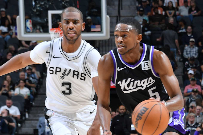 SAN ANTONIO, TX - NOVEMBER 11:  De'Aaron Fox #5 of the Sacramento Kings dribbles the ball during the game against the San Antonio Spurs during a regular season game on November 11, 2024 at the Frost Bank Center in San Antonio, Texas. NOTE TO USER: User expressly acknowledges and agrees that, by downloading and or using this photograph, user is consenting to the terms and conditions of the Getty Images License Agreement. Mandatory Copyright Notice: Copyright 2024 NBAE (Photos by Michael Gonzales/NBAE via Getty Images)