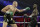 Tyson Fury, left, of England, fight Deontay Wilder during a WBC heavyweight championship boxing match Saturday, Feb. 22, 2020, in Las Vegas. (AP Photo/Isaac Brekken)