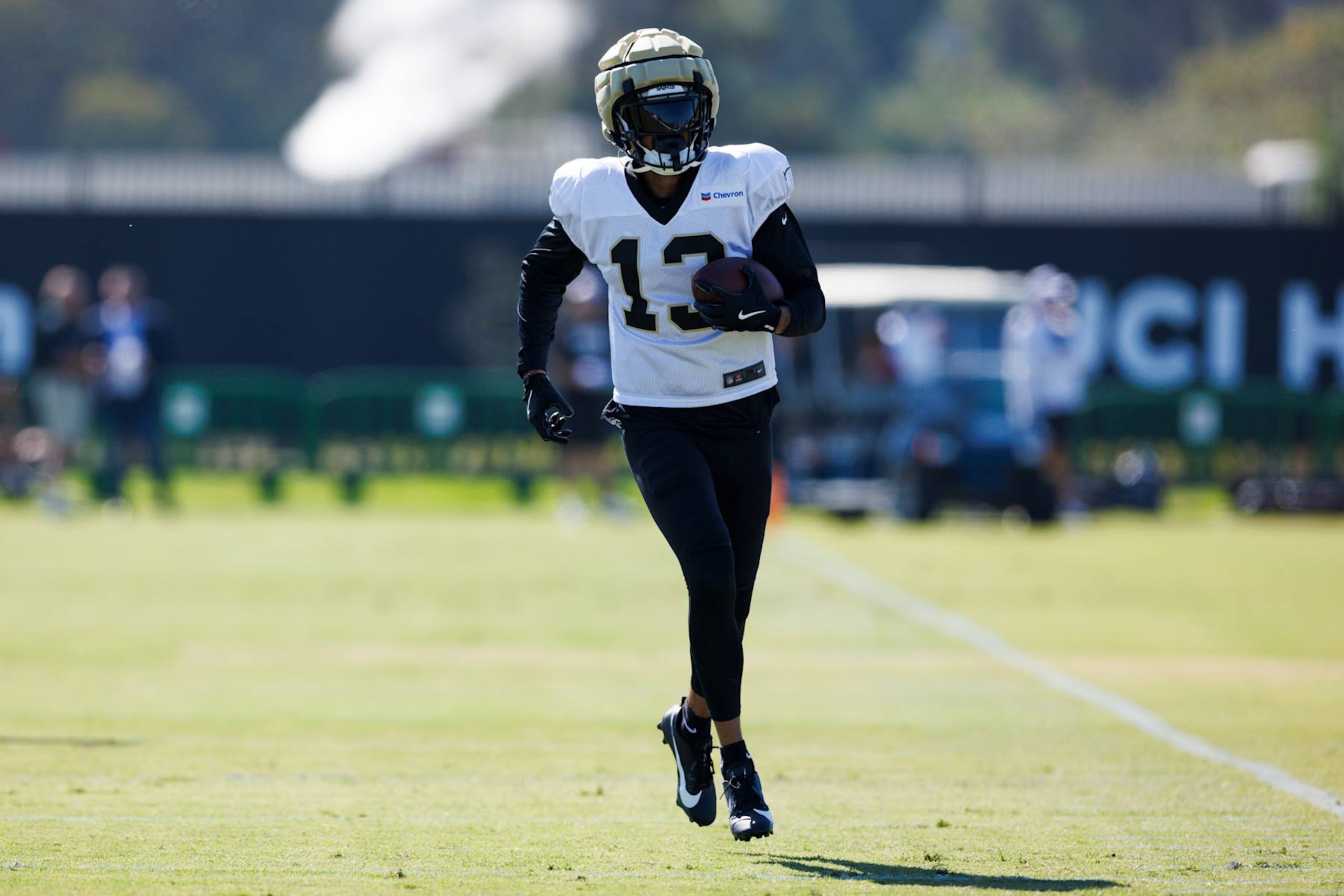 IRVINE, CALIFORNIA - JULY 29: Equanimeous St. Brown #13 of the New Orleans Saints runs after the catch during training camp at University of California Irvine on July 29, 2024 in Irvine, California.  (Photo by Ric Tapia/Getty Images)