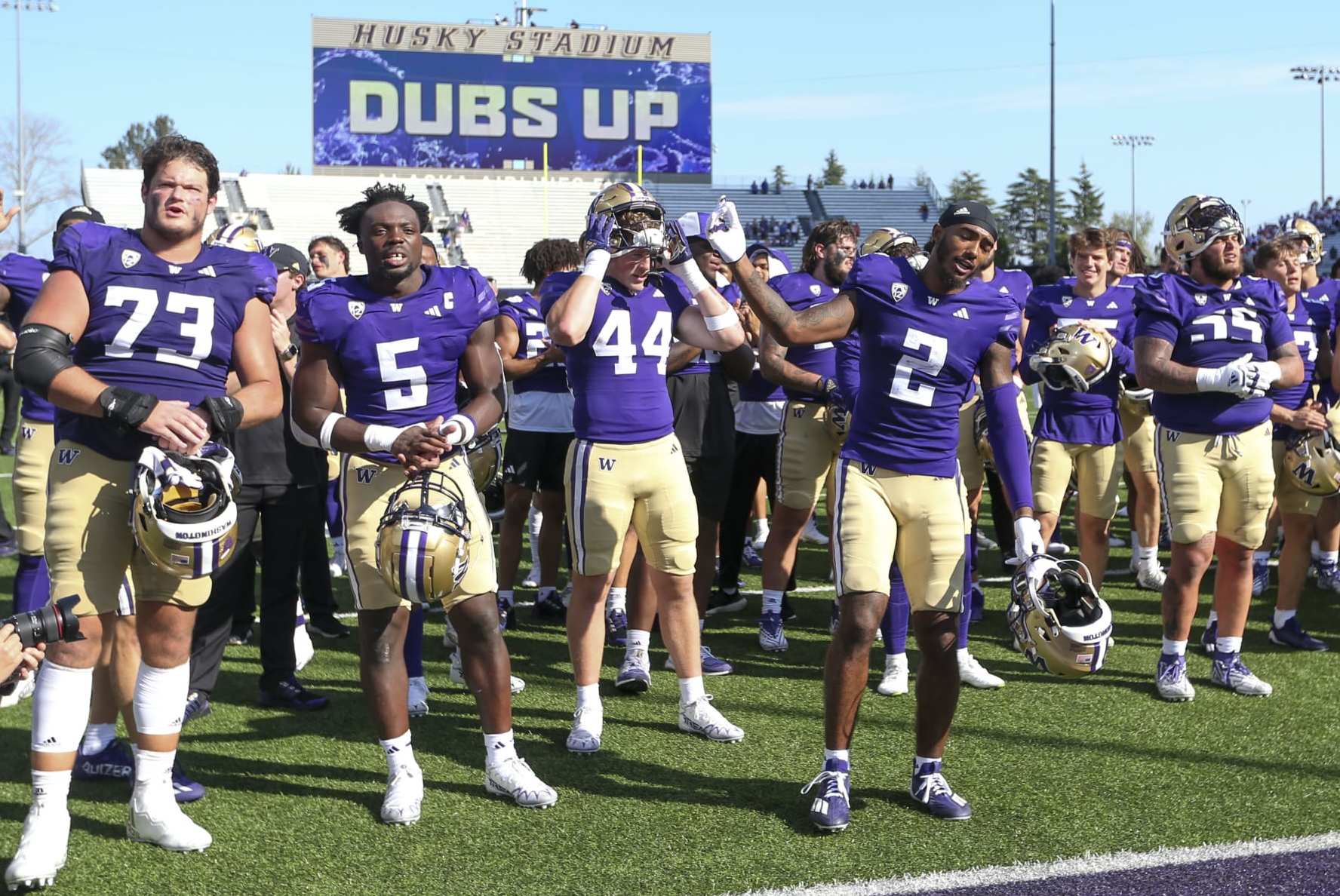 SEATTLE, WA - SEPTEMBER 02: Washington players sang the school fight song after the game to fans during a college football game between the Washington Huskies and Boise State Broncos on September 02, 2023, at Husky Stadium in Seattle, WA. (Photo by Jesse Beals/Icon Sportswire via Getty Images)