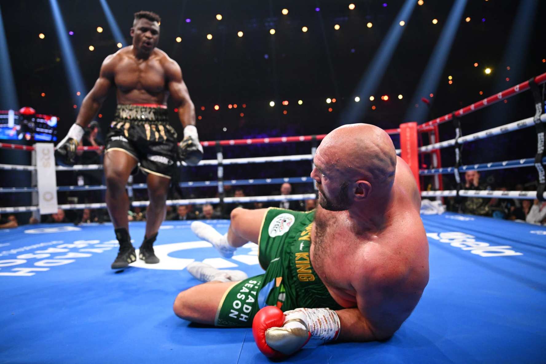 RIYADH, SAUDI ARABIA - OCTOBER 28: Francis Ngannou knocks down Tyson Fury during the Heavyweight fight between Tyson Fury and Francis Ngannou at Boulevard Hall on October 28, 2023 in Riyadh, Saudi Arabia. (Photo by Justin Setterfield/Getty Images)