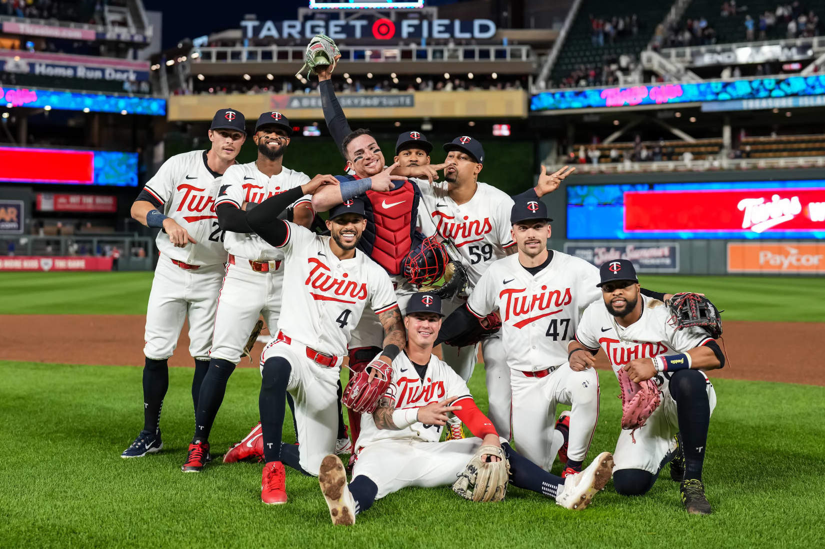 MINNEAPOLIS, MN - MAY 28: Members of the Minnesota Twins celebrate the victory and pose for a photo following the game against the Kansas City Royals on May 28, 2024 at Target Field in Minneapolis, Minnesota. (Photo by Brace Hemmelgarn/Minnesota Twins/Getty Images)