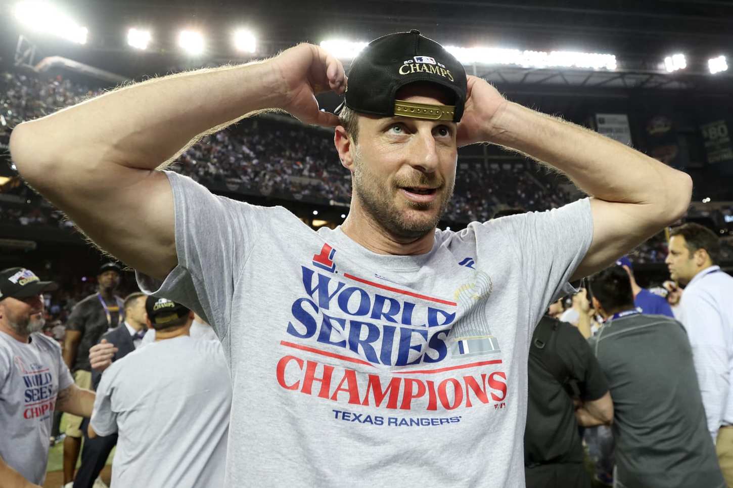 PHOENIX, ARIZONA - NOVEMBER 01: Max Scherzer #31 of the Texas Rangers celebrates after the Texas Rangers beat the Arizona Diamondbacks 5-0 in Game Five to win the World Series at Chase Field on November 01, 2023 in Phoenix, Arizona. (Photo by Christian Petersen/Getty Images)