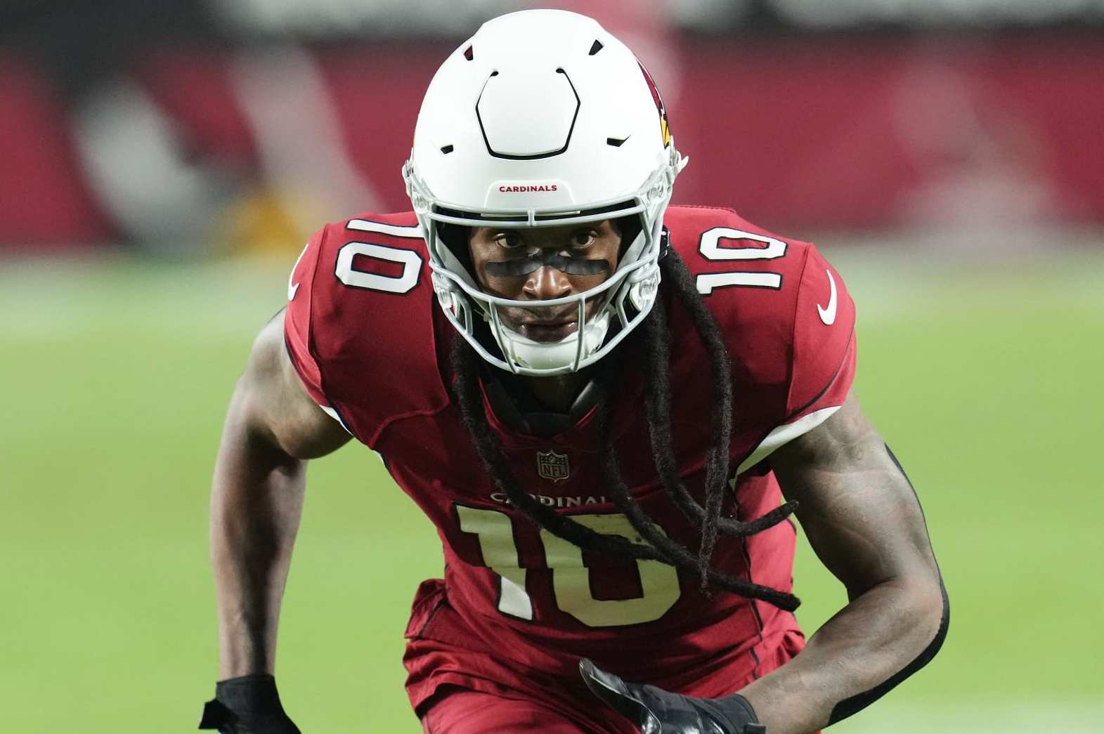 Arizona Cardinals wide receiver DeAndre Hopkins runs down field against the New England Patriots during the first half of an NFL football game in Glendale, Ariz., Monday, Dec. 12, 2022. (AP Photo/Ross D. Franklin)