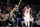 BOSTON, MASSACHUSETTS - OCTOBER 18: Jayson Tatum #0 of the Boston Celtics celebrates hitting a three-point shot in front of Joel Embiid #21 of the Philadelphia 76ers during the first half at TD Garden on October 18, 2022 in Boston, Massachusetts. NOTE TO USER: User expressly acknowledges and agrees that, by downloading and or using this photograph, User is consenting to the terms and conditions of the Getty Images License Agreement. (Photo by Maddie Meyer/Getty Images)