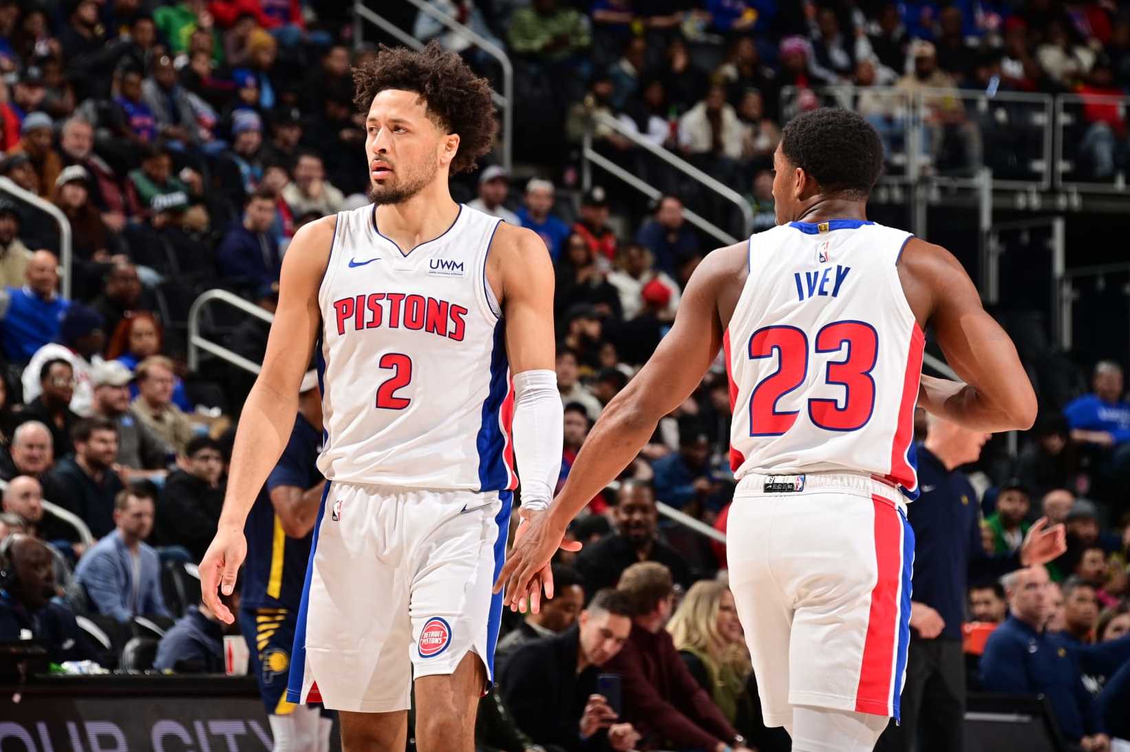 DETROIT, MI - DECEMBER 11: Jaden Ivey #23 high fives Cade Cunningham #2 of the Detroit Pistons during the game against the Indiana Pacers on December 11, 2023 at Little Caesars Arena in Detroit, Michigan. NOTE TO USER: User expressly acknowledges and agrees that, by downloading and/or using this photograph, User is consenting to the terms and conditions of the Getty Images License Agreement. Mandatory Copyright Notice: Copyright 2023 NBAE (Photo by Chris Schwegler/NBAE via Getty Images)