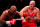 LONDON, ENGLAND - DECEMBER 03: Tyson Fury (R) punches  Derek Chisora (L) during the WBC World Heavyweight Title fight between Tyson Fury and Derek Chisora at Tottenham Hotspur Stadium on December 03, 2022 in London, England. (Photo by Warren Little/Getty Images)