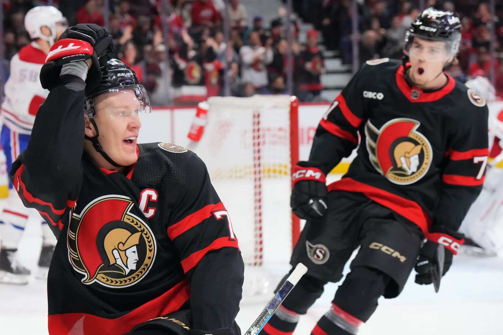 Brady Tkachuk, left, and Ridley Greig.
