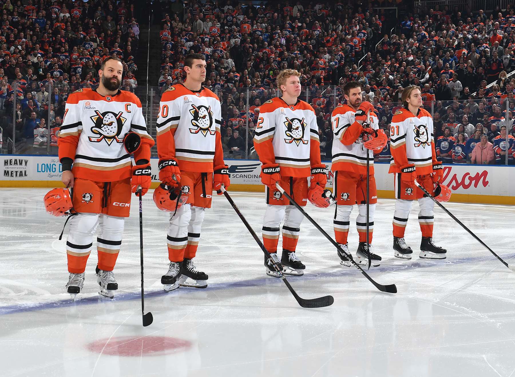 EDMONTON, CANADA - JANUARY 3: Radko Gudas #7, Brett Leason #20, Jackson LaCombe #2, Alex Killorn #17 and Leo Carlsson #91 of the Anaheim Ducks stand for the singing of the national anthem prior to the game against the Anaheim Ducks at Rogers Place on January 3, 2025, in Edmonton, Alberta, Canada. (Photo by Andy Devlin/NHLI via Getty Images)
