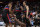 DETROIT, MI - DECEMBER 16: Isaiah Stewart #28 of the Detroit Pistons is helped up by teammates Alec Burks #5, Jalen Duren #0, and Bojan Bogdanovic #44 during the game against the Sacramento Kings on December 16, 2022 at Little Caesars Arena in Detroit, Michigan. NOTE TO USER: User expressly acknowledges and agrees that, by downloading and/or using this photograph, User is consenting to the terms and conditions of the Getty Images License Agreement. Mandatory Copyright Notice: Copyright 2022 NBAE (Photo by Brian Sevald/NBAE via Getty Images)