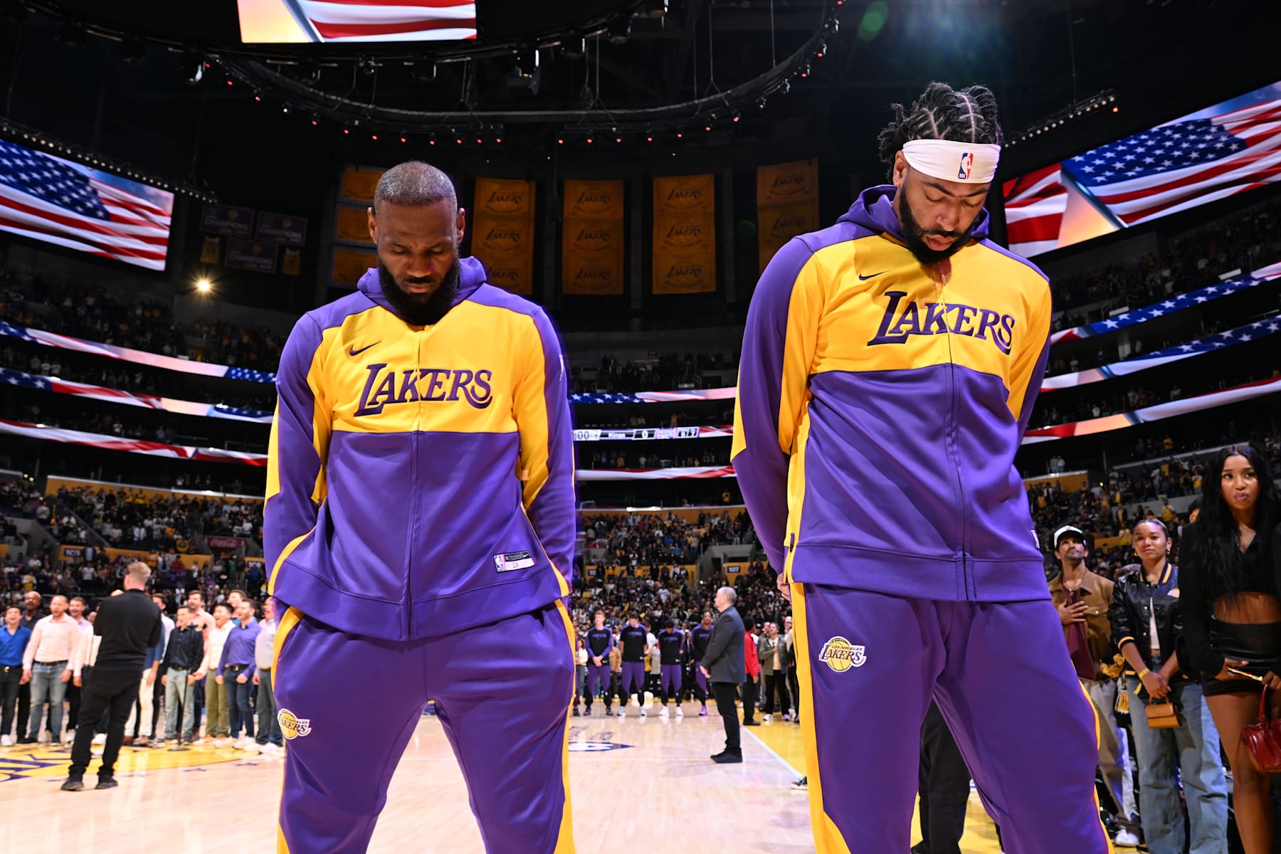 LOS ANGELES, CA - OCTOBER 26: LeBron James #23 and Anthony Davis #3 of the Los Angeles Lakers stand for the National Anthem before the game against the Sacramento Kings on October 26, 2024 at Crypto.Com Arena in Los Angeles, California. NOTE TO USER: User expressly acknowledges and agrees that, by downloading and/or using this Photograph, user is consenting to the terms and conditions of the Getty Images License Agreement. Mandatory Copyright Notice: Copyright 2024 NBAE (Photo by Adam Pantozzi/NBAE via Getty Images)