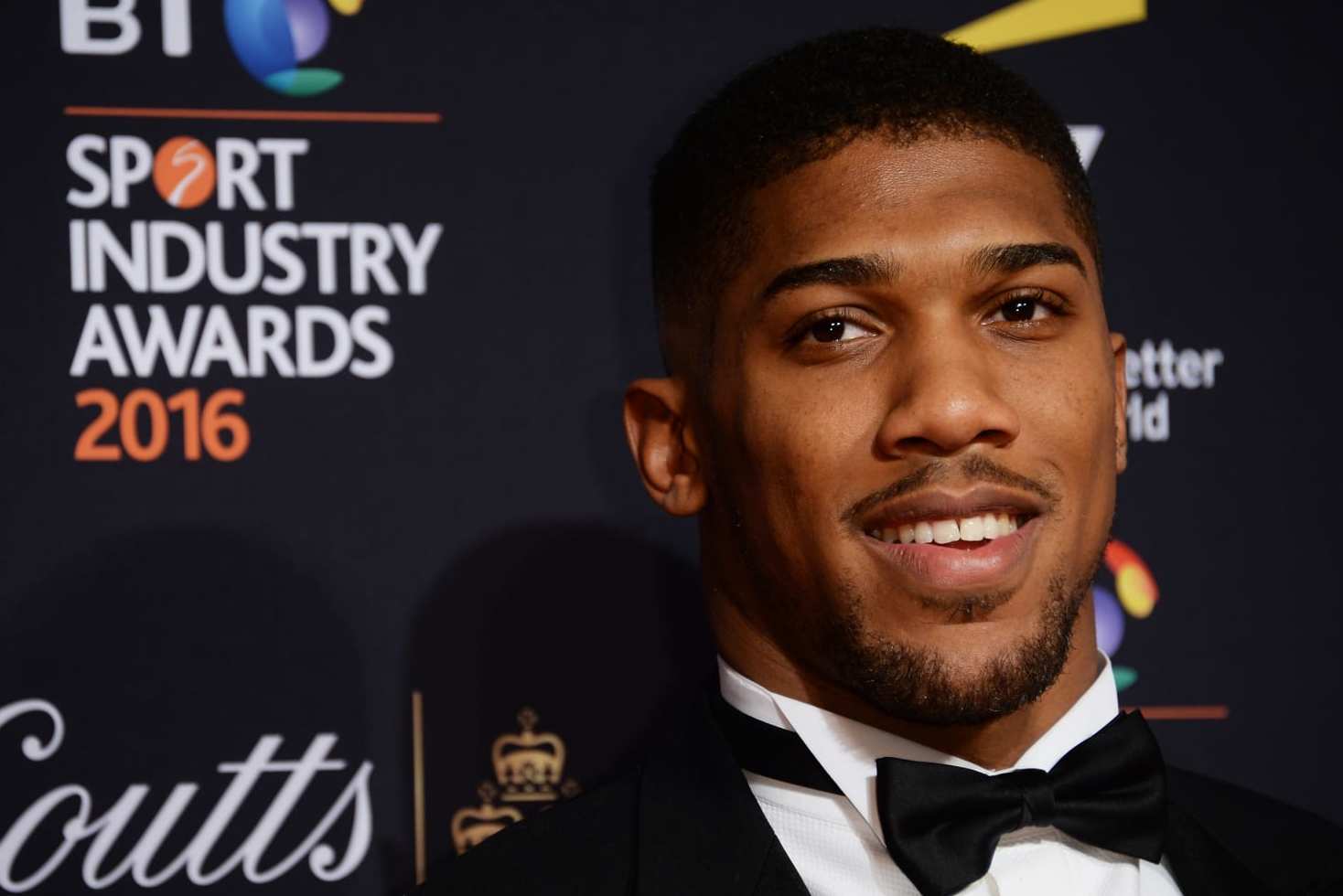 LONDON, ENGLAND - APRIL 28:  Boxer Anthony Joshua poses on the red carpet at the BT Sport Industry Awards 2016 at Battersea Evolution on April 28, 2016 in London, England. The BT Sport Industry Awards is the most prestigious commercial sports awards ceremony in Europe, where over 1750 of the industry's key decision-makers mix with high profile sporting celebrities for the most important networking occasion in the sport business calendar.  (Photo by Anthony Harvey/Getty Images for BT Sport Industry Awards)
