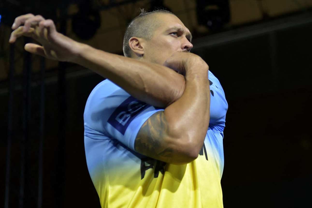 Ukraine's Oleksandr Usyk gestures during a media gathering ahead of heavyweight boxing rematch for the WBA, WBO, IBO and IBF titles between Usyk and Britain's Anthony Joshua, in the Saudi Red Sea city of Jeddah, on August 16, 2022. - The match, billed as Rage on the Red Sea, is set to take place on August 20, 2022, at the Jeddah Super Dome. (Photo by Amer HILABI / AFP) (Photo by AMER HILABI/AFP via Getty Images)