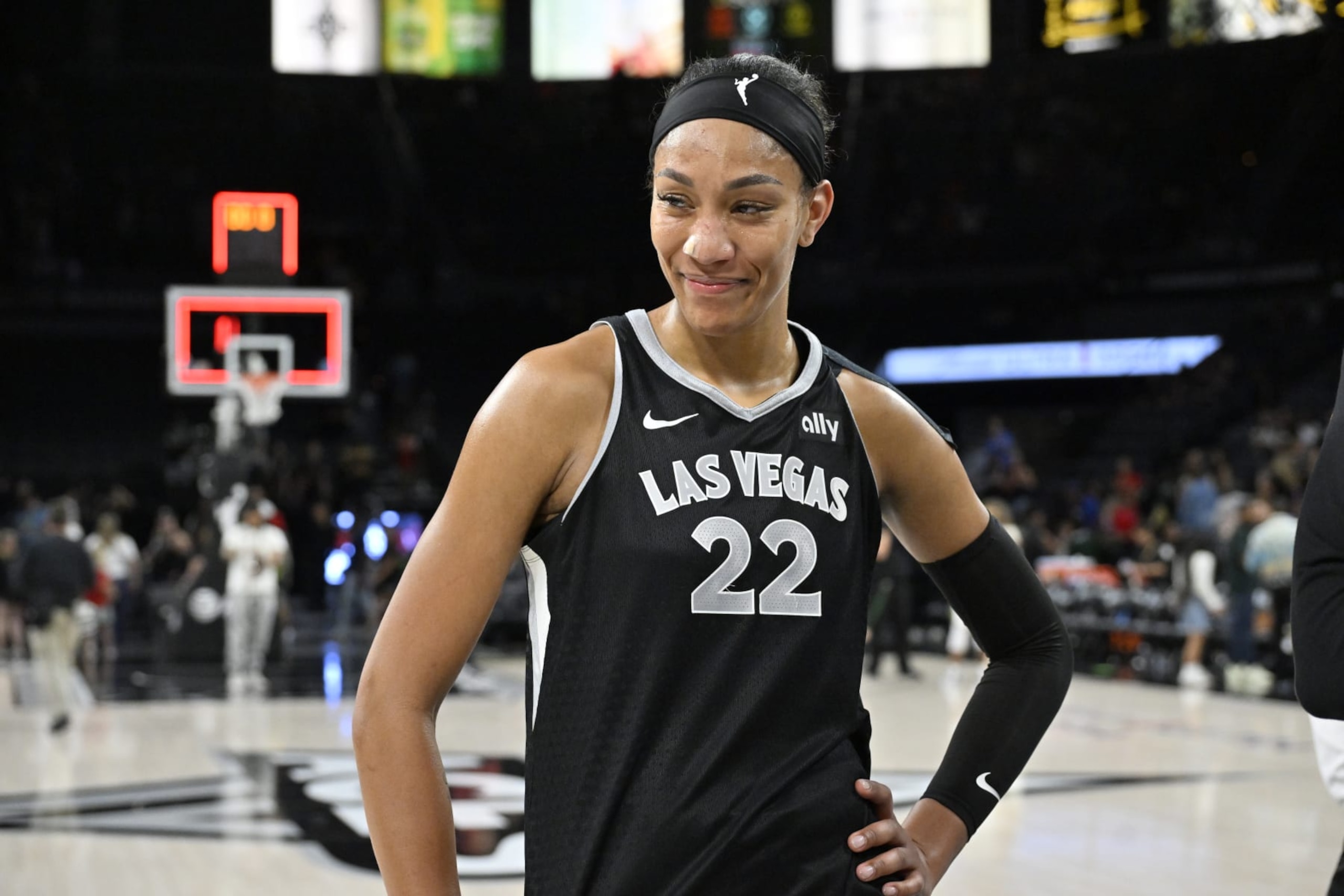 LAS VEGAS, NV - JUNE 7: A'ja Wilson #22 of the Las Vegas Aces smiles after the game against the Seattle Storm during the 2024 WNBA Commissioner's Cup on June 7, 2024 at Michelob ULTRA Arena in Las Vegas, Nevada. NOTE TO USER: User expressly acknowledges and agrees that, by downloading and or using this photograph, User is consenting to the terms and conditions of the Getty Images License Agreement. Mandatory Copyright Notice: Copyright 2024 NBAE (Photo by David Becker/NBAE via Getty Images) LAS VEGAS, NV - JUNE 7: A'ja Wilson #22 of the Las Vegas Aces smiles after the game against the Seattle Storm during the 2024 WNBA Commissioner's Cup on June 7, 2024 at Michelob ULTRA Arena in Las Vegas, Nevada. NOTE TO USER: User expressly acknowledges and agrees that, by downloading and or using this photograph, User is consenting to the terms and conditions of the Getty Images License Agreement. Mandatory Copyright Notice: Copyright 2024 NBAE (Photo by David Becker/NBAE via Getty Images)